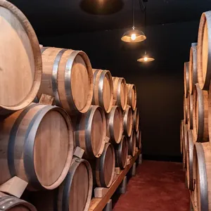 oak barrels stacked in cellar