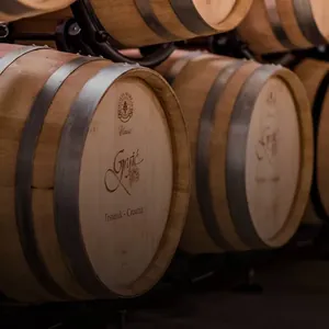 branded oak barrels in cellar