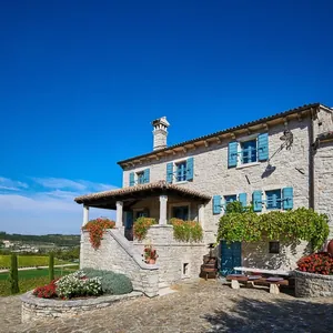 stone winery house, blue shutters