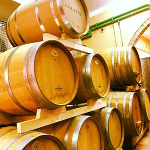 oak barrels stacked in cellar