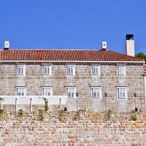 Stone winery building above wall