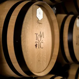 Tomic-branded oak barrels in cellar